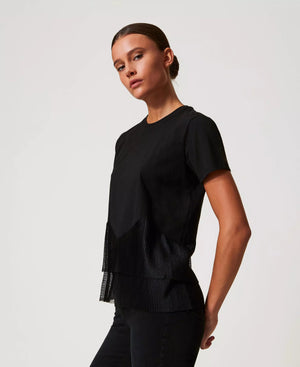Tee à peplum en maille plissée translucide à plumetis