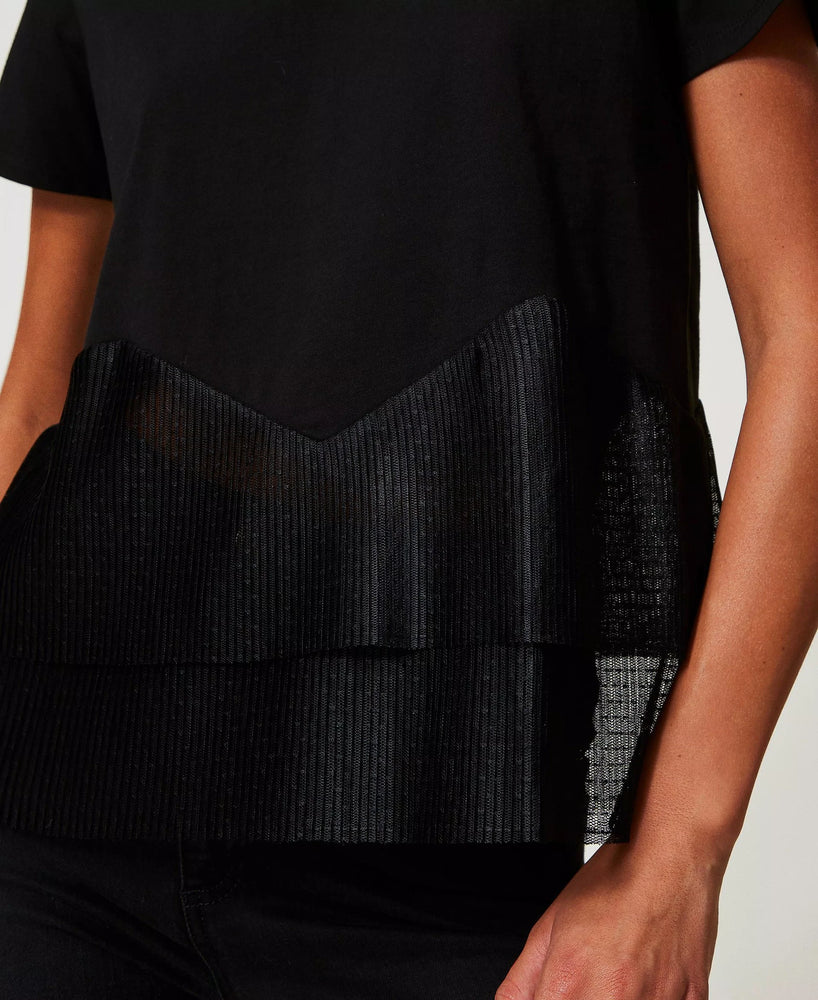 Tee à peplum en maille plissée translucide à plumetis